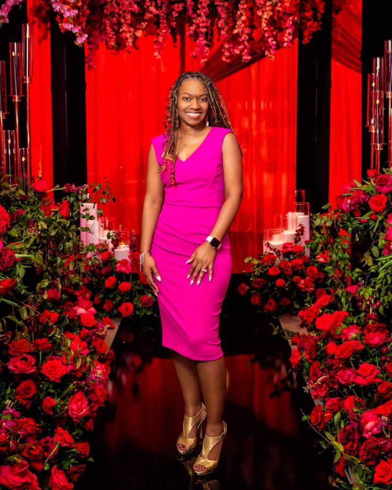 Dr Marsha with flowers at wedding